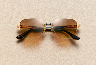 Oscar Black Brown Gradient rimless sunglasses in black acetate and 18K gold-plated titanium, L'Écurie Paris