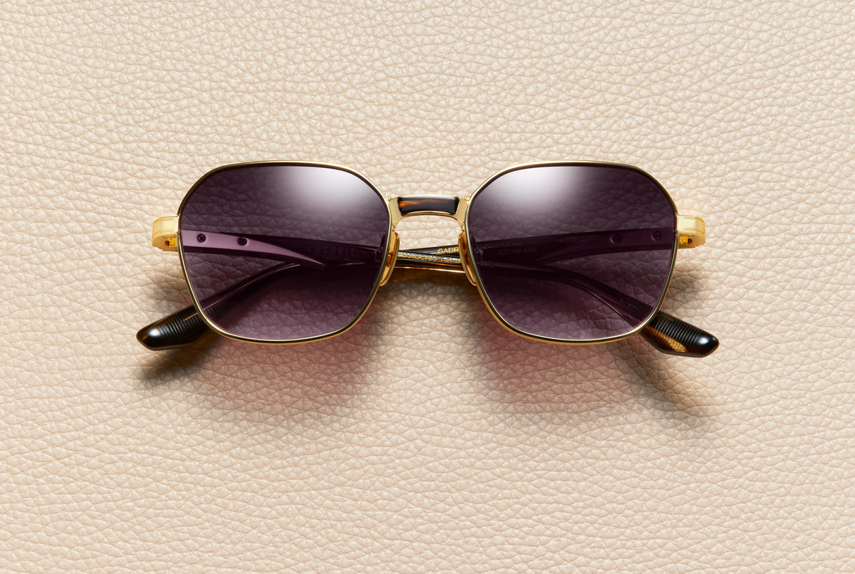 Gabriel Smoke sunglasses by L'Écurie Paris, geometric 24K gold-plated titanium frame with smoke acetate and dark night gradient lenses