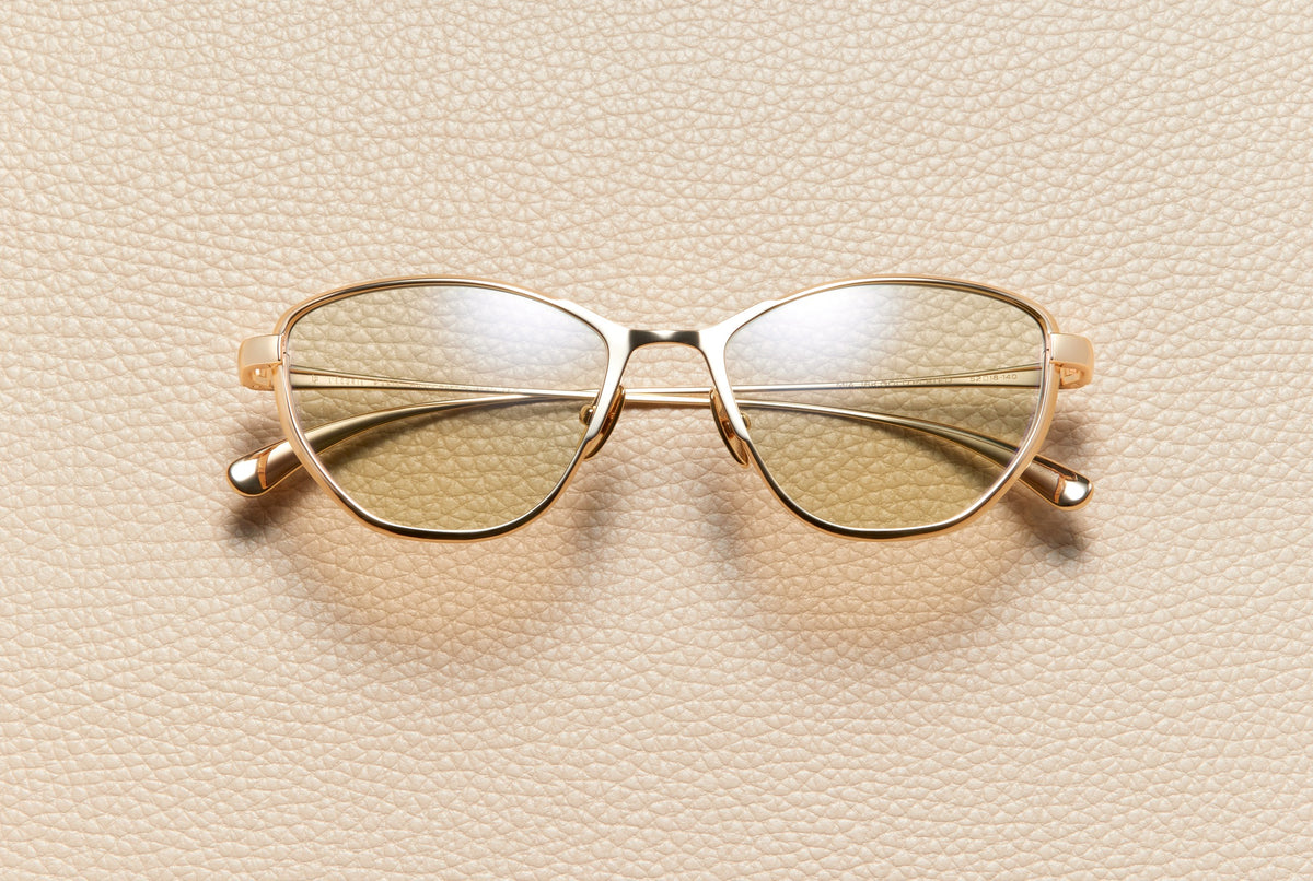 Mia cat-eye sunglasses in 18K yellow gold plated titanium with sand lenses by L'Écurie Paris