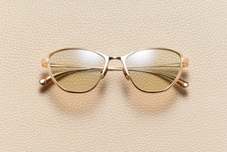 Mia cat-eye sunglasses in 18K yellow gold plated titanium with sand lenses by L'Écurie Paris