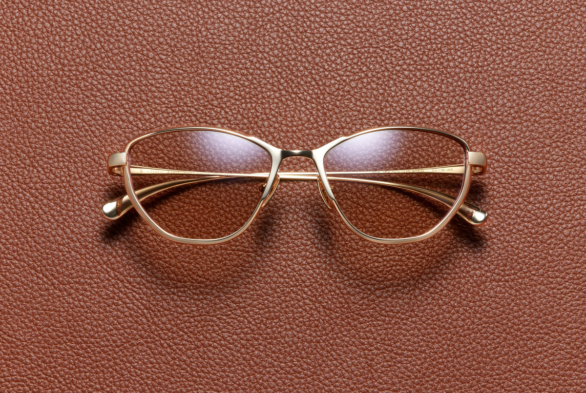 Mia cat-eye optical frame in 18K yellow gold plated titanium by L'Écurie Paris
