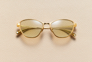 Mia cat-eye sunglasses in 24K yellow gold plated titanium with baby brown gradient lenses by L'Écurie Paris