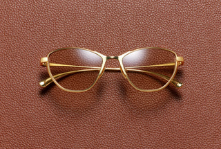 Mia cat-eye optical frame in 24K yellow gold plated titanium by L'Écurie Paris