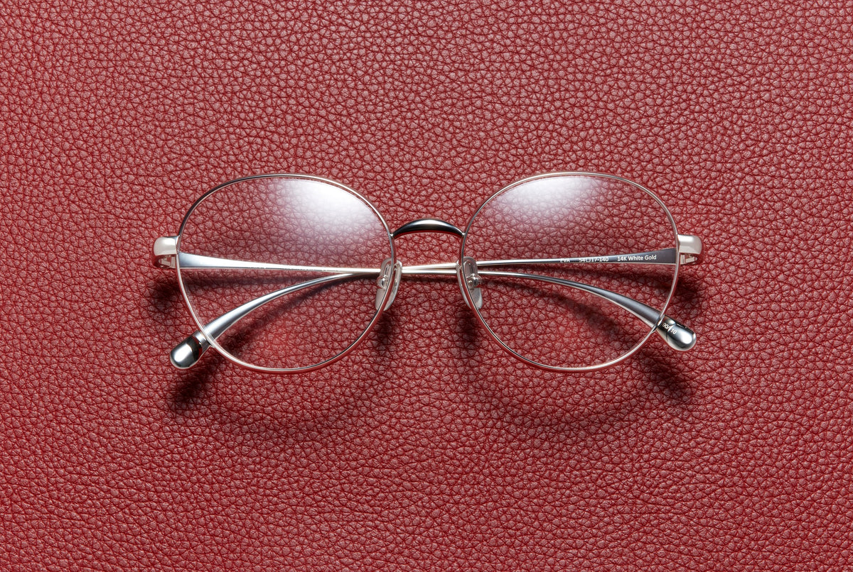 Eva round optical frame in 14K white gold plated titanium by L'Écurie Paris
