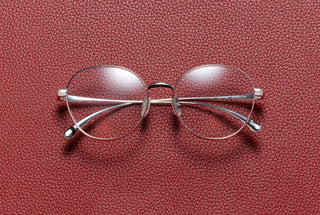Eva round optical frame in 14K white gold plated titanium by L'Écurie Paris
