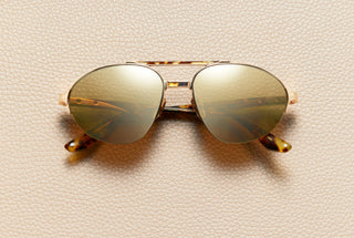 John Tortoise aviator sunglasses by L'Écurie Paris in 18K gold-plated titanium and tortoise acetate with gold mirror lenses
