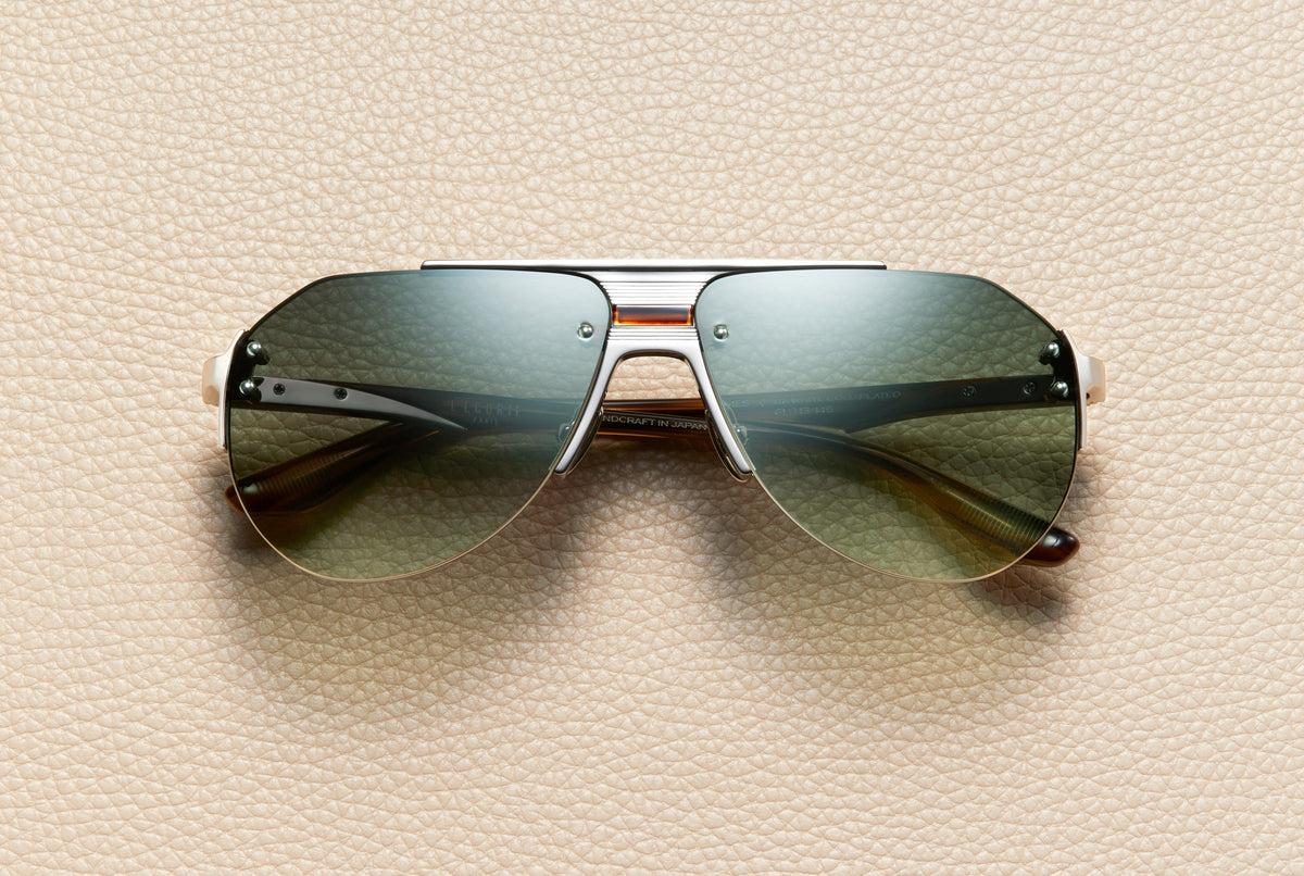 James Rosewood rimless aviator sunglasses by L'Écurie Paris in 14K white gold-plated titanium and rosewood acetate with forest green gradient lenses