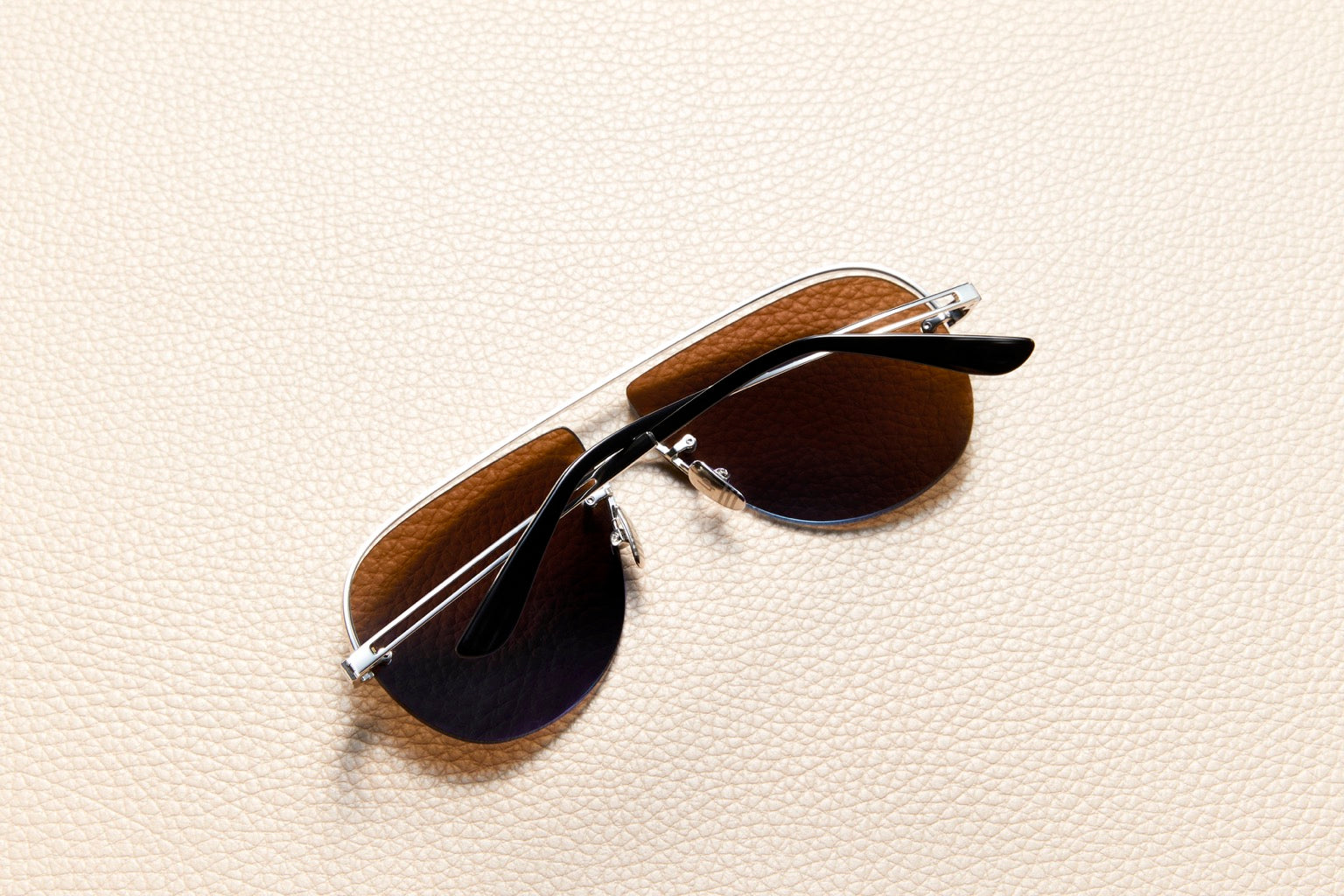 Leo Dolphin Blue Sunglasses – Back View | 14K White Gold Plated Titanium | Inui Lens – Dolphin Blue | L'Écurie Paris