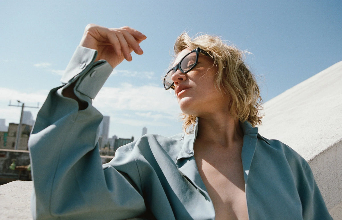 Chelsea Frei wearing L’Écurie Paris Victor sunglasses in a rooftop close-up for Vestal Magazine