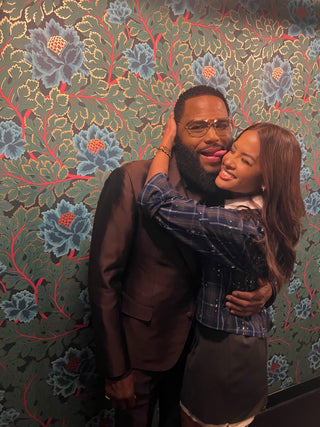 Anthony Anderson in L'Écurie Paris Leo 18K plated gold glasses with Rocsi Diaz at Jimmy Kimmel Live