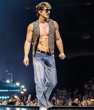 Benson Boone walking the stage in L'Écurie Paris Elsa Black sunglasses, The Wanted Man Tour