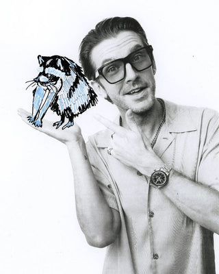Dan Stevens in L'Écurie Paris Victor Black sunglasses, EW photo studio portrait at Comic-Con 2026